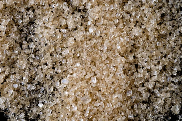 Hnědý cukr background.Components textura potravin je sladká lahodná. — Stock fotografie