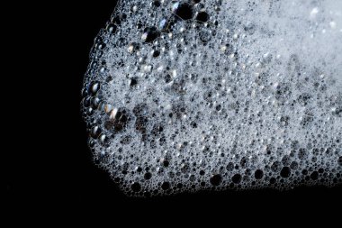 Arka plan beyaz sabunlu köpük doku. Şampuan köpük ile 