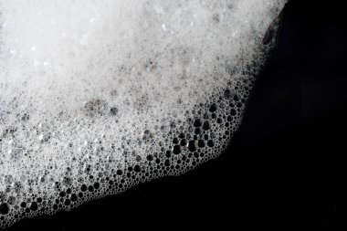 Arka plan beyaz sabunlu köpük doku. Şampuan köpük ile 