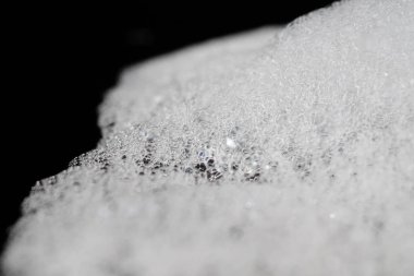 Arka plan beyaz sabunlu köpük doku. Şampuan köpük ile 