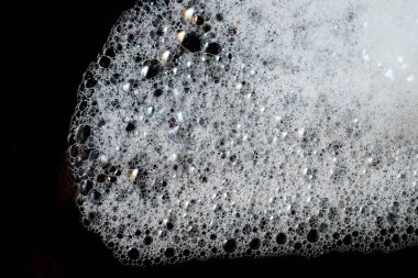 Arka plan beyaz sabunlu köpük doku. Şampuan köpük ile 