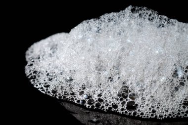 Arka plan beyaz sabunlu köpük doku. Şampuan köpük ile 
