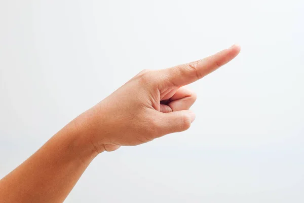 Hand pointing on object with forefinger — Stock Photo, Image