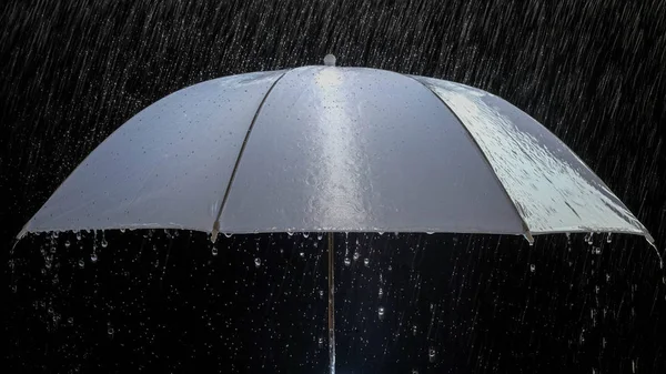 Wet protection umbrella in stormy weather with natural thunderstorm, on black background, — Stock Photo, Image