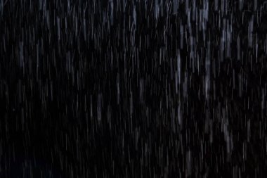 Soyut yağmur dokusu arka planı. arkaplan yağmuru gece ışığında