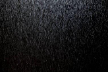 Soyut yağmur dokusu arka planı. arkaplan yağmuru gece ışığında