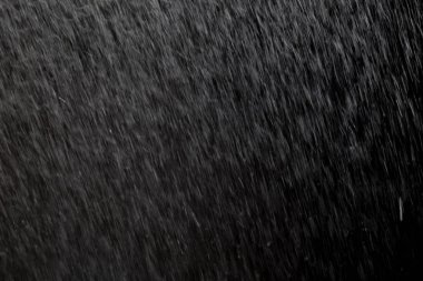 Soyut yağmur dokusu arka planı. arkaplan yağmuru gece ışığında