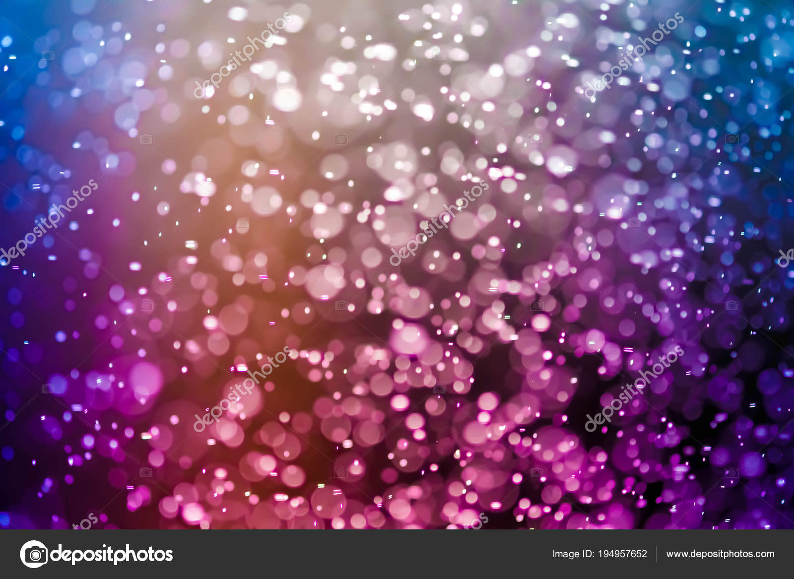 クリスマスぼかしボケ味の背景のテクスチャの抽象的な光 Glitterin