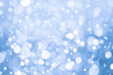 Bokeh 'te noel arkaplanı deseni soyut ışık parıldayan yıldızlar. simli klasik ışık arkaplanı