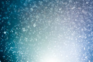 Bokeh 'te noel arkaplanı deseni soyut ışık parıldayan yıldızlar. simli klasik ışık arkaplanı