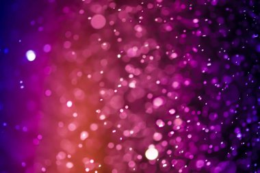 Bokeh 'te noel arkaplanı deseni soyut ışık parıldayan yıldızlar. simli klasik ışık arkaplanı