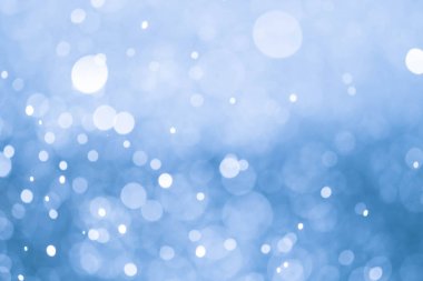 Bokeh 'te noel arkaplanı deseni soyut ışık parıldayan yıldızlar. simli klasik ışık arkaplanı