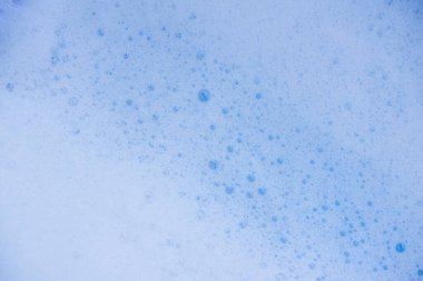 Soyut arka plan beyaz sabunlu köpük dokusu. Köpüklü şampuan köpüğü.