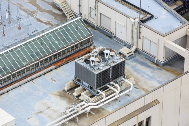 Cooling tower on rooftop clipart