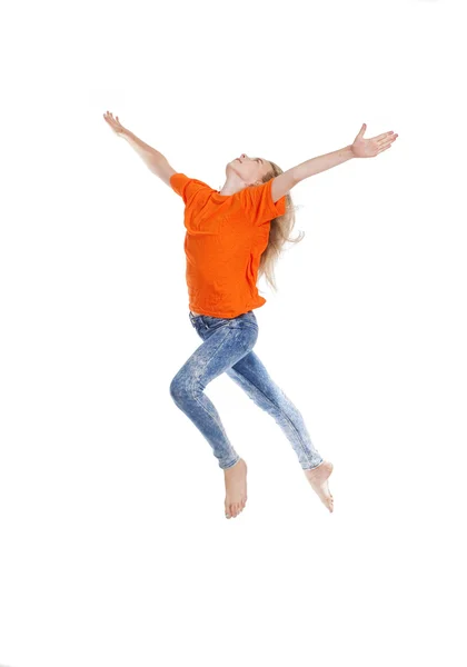 Chica joven con el pelo rubio saltando en el aire —  Fotos de Stock