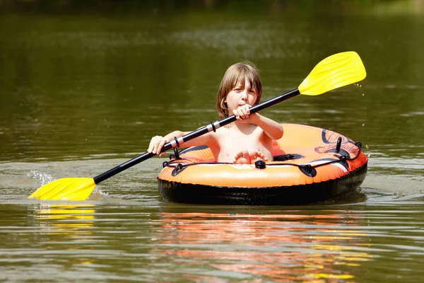 Boy with Blond Hair Paddles Inflatable Rubber Boat — Stock Photo, Image