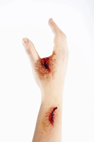 Künstliche Blutwunde an der menschlichen Hand — Stockfoto