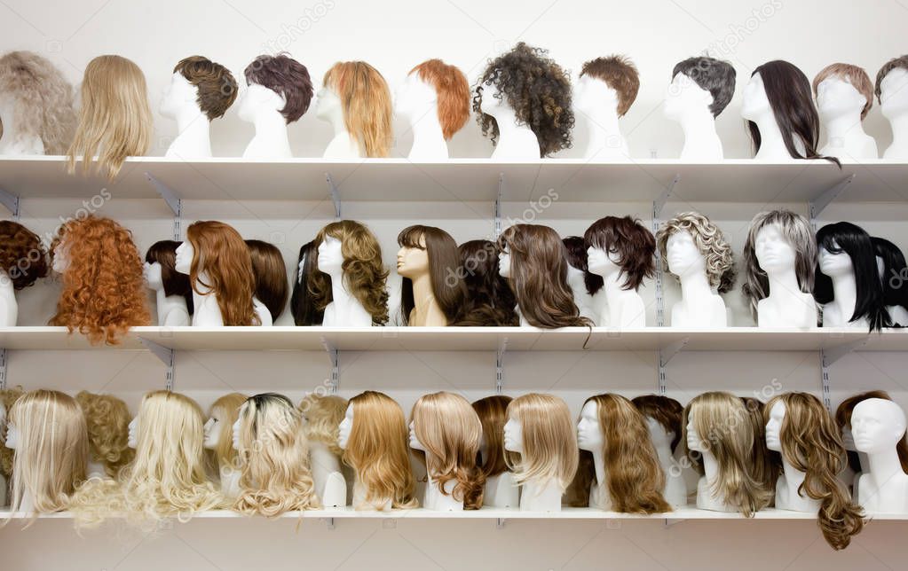 Row of Mannequin Heads with Wigs 