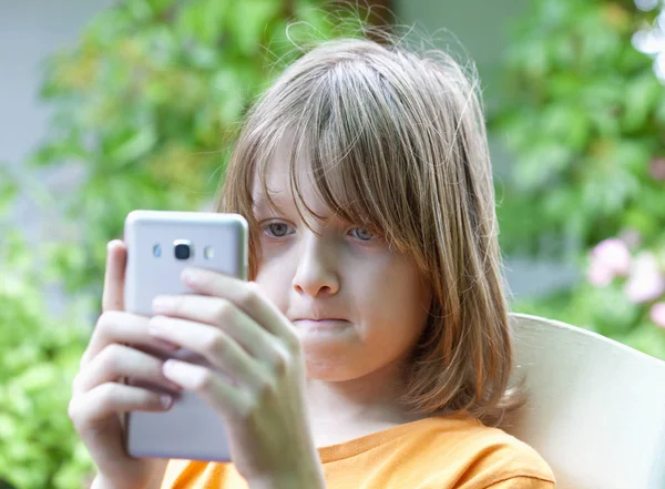 Boy Looking at Mobile Phone — Stock Photo, Image