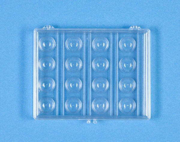 Plastic Box on Blue Background. — Stock Photo, Image