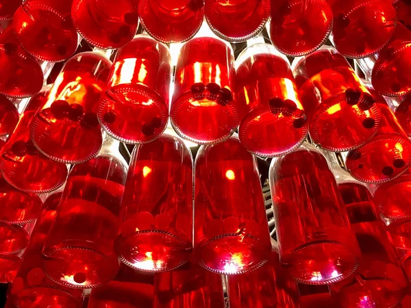 Chandelier made from bottles of cherry liqueur — Stock Photo, Image
