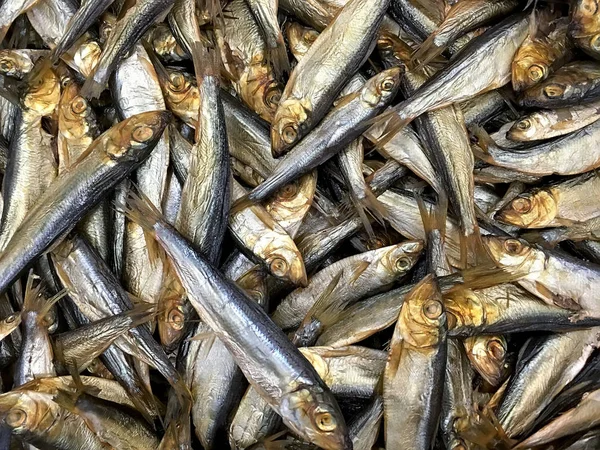 Many smoked fish sprats closeup — Stock Photo, Image