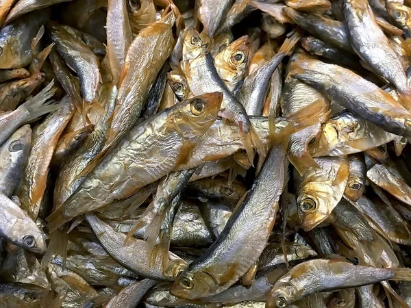 Many smoked fish sprats closeup — Stock Photo, Image