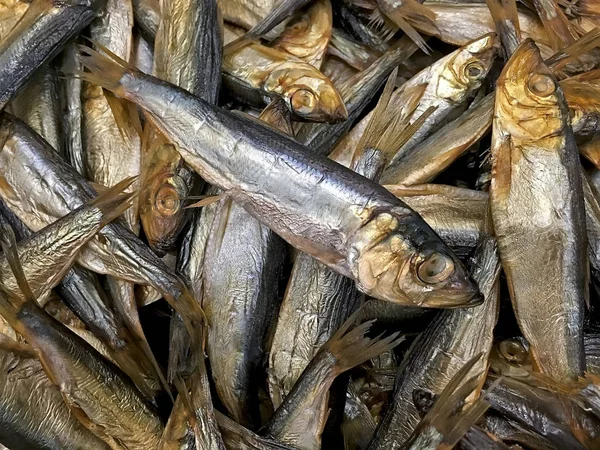 Many smoked fish sprats closeup — Stock Photo, Image