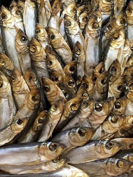 Many smoked fish sprats closeup — Stock Photo, Image