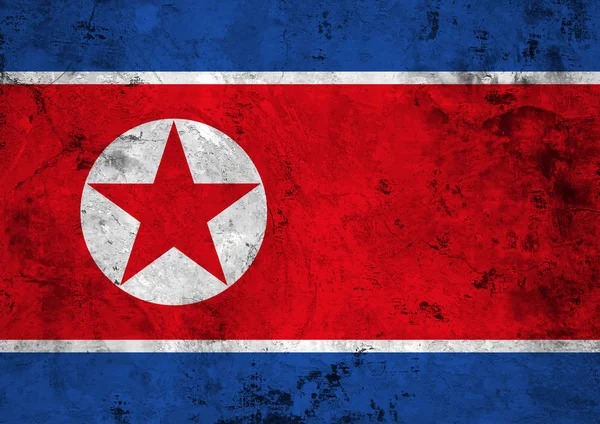 Bandiera nordcoreana sullo sfondo della texture in pietra — Foto Stock
