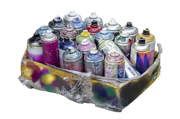 Spray cans of aerosol paint in a cardboard box — Stock Photo, Image