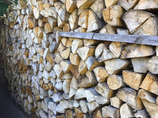 Stacked firewood (woodpile) for an open-air stove — Stock Photo, Image