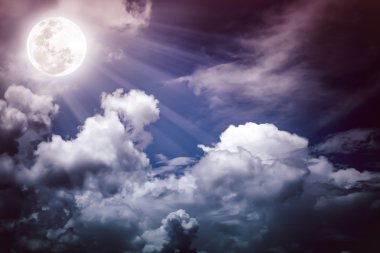 Nighttime sky with clouds, bright full moon.  clipart