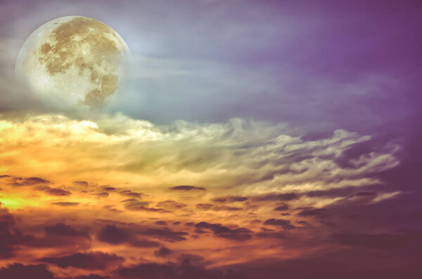 Attractive photo of a beautiful sky with clouds, bright full moon would make a great background. Beauty of nature use as background. Outdoors. Vintage style.