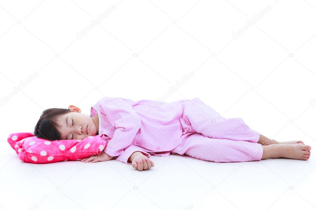 Full body. Healthy children concept. Asian girl sleeping peacefully, on white background.