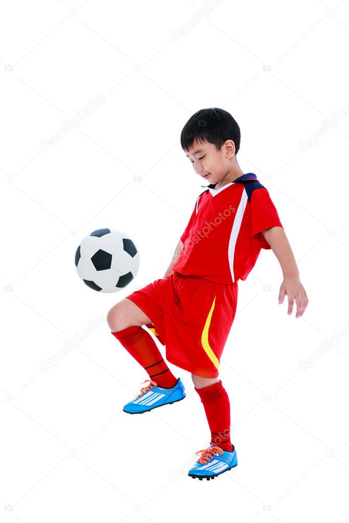 Young asian soccer player with soccer ball. Studio shot.