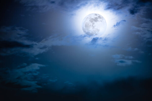 Attractive photo of background nighttime sky with cloud and bright full moon with shiny. Nightly sky with beautiful full moon. Outdoors at night. The moon were NOT furnished by NASA.