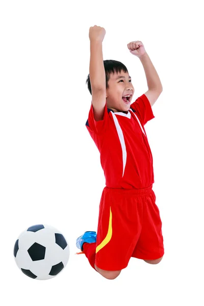 Jugador de fútbol asiático mostrando gesto de brazo hacia arriba. Acción del ganador o del éxito — Foto de Stock