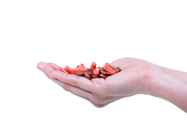 Muchos medicamentos en la palma, aislados sobre fondo blanco . — Foto de Stock