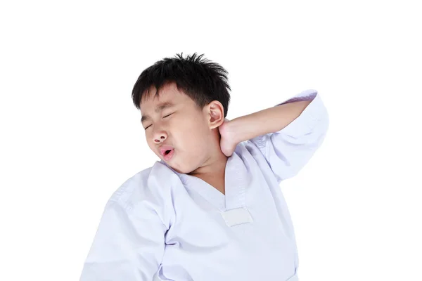 Asian child athletes taekwondo have a neck pain. Isolated on whi — Stock Photo, Image