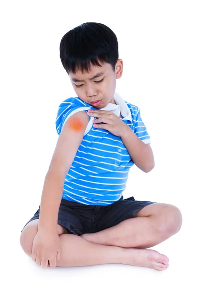 Full body of asian child injured at shoulder. Isolated on white background. — Stock Photo, Image