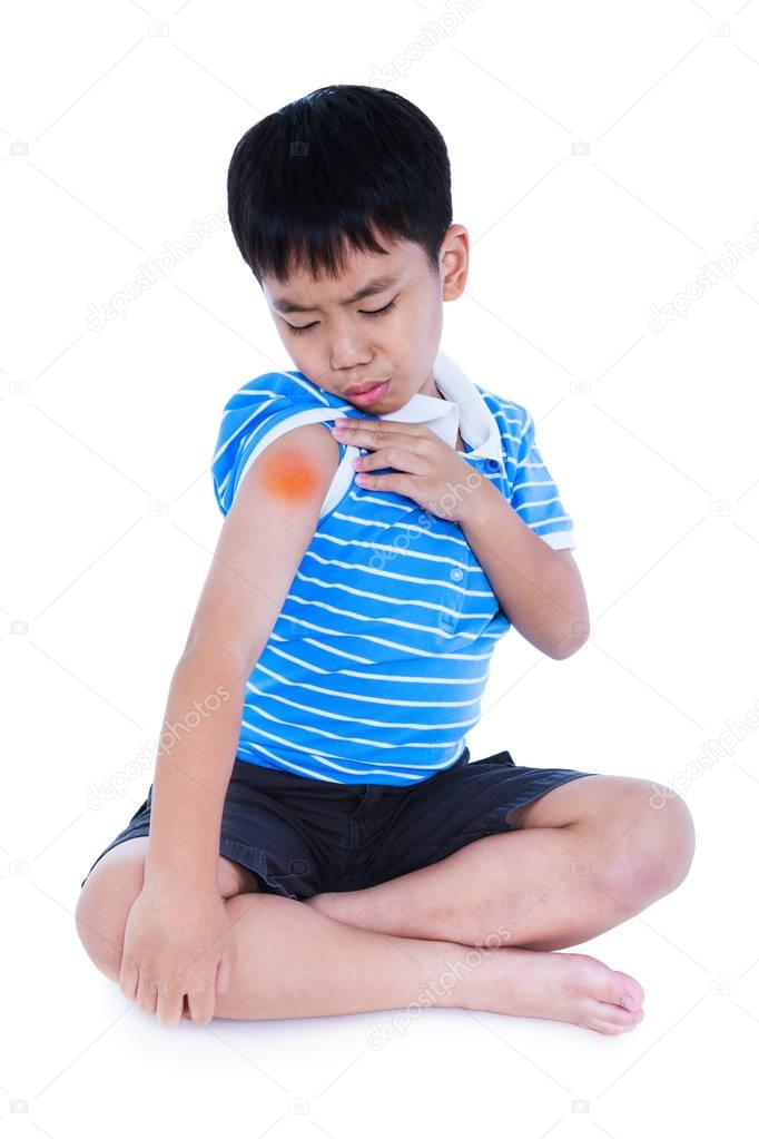 Full body of asian child injured at shoulder. Isolated on white background.