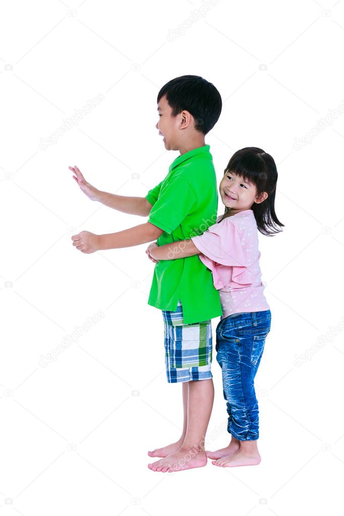 Asian sister hugging his brother smiling happily, isolated on white background. 