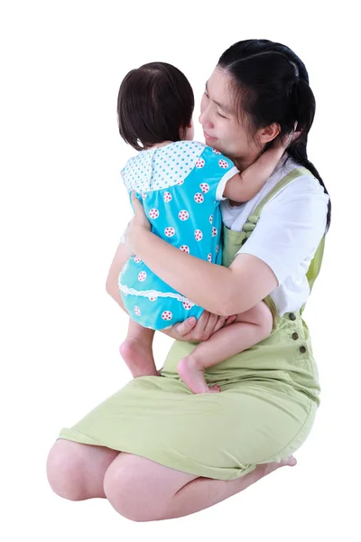 Happy asian mother carrying her daughter. Isolated on white back — Stock Photo, Image