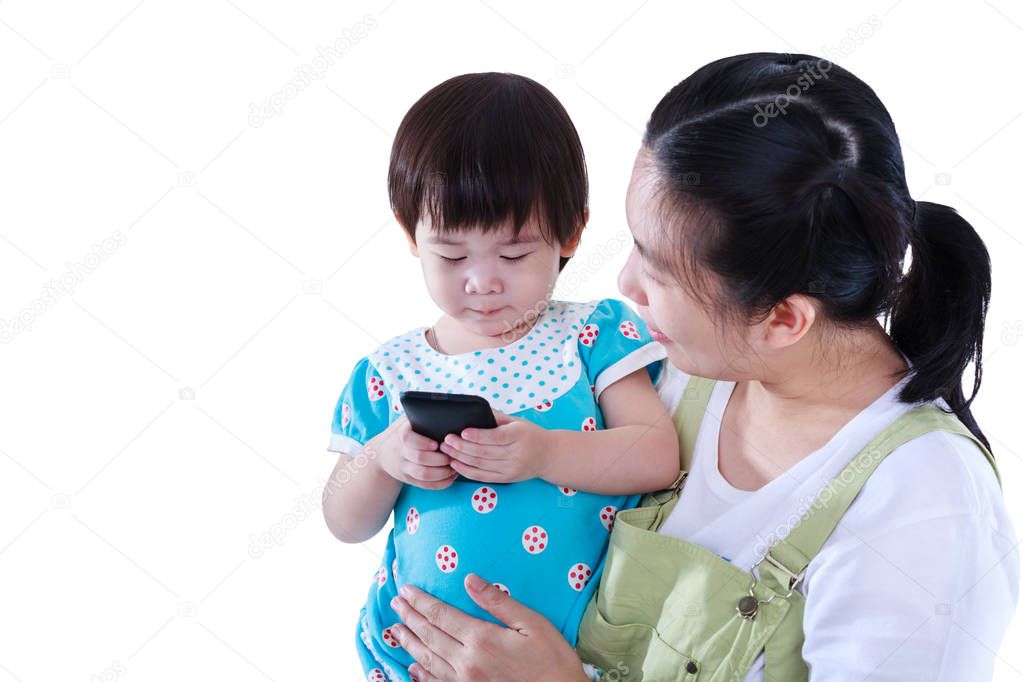 Mother with her daughter. Girl using electronic gadget. Isolated on white background.