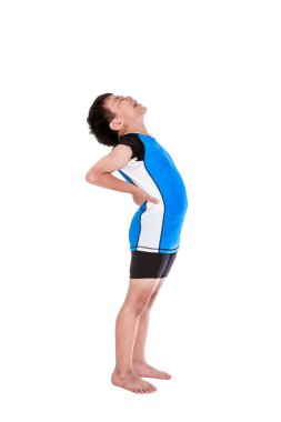 Asian child athletes suffering from low back pain. Isolated on white background. clipart
