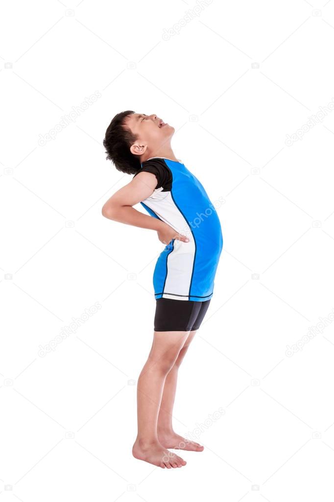 Asian child athletes suffering from low back pain. Isolated on white background.