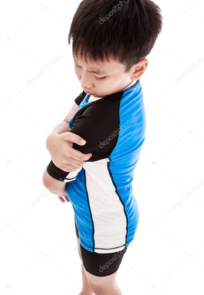 Sports injure. Asian child injured at shoulder. Isolated on white background.