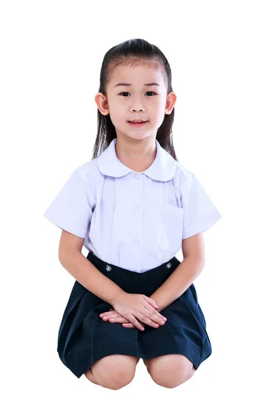 Young preschool child in uniform smiling at studio. Isolated on white background. — Stock Photo, Image