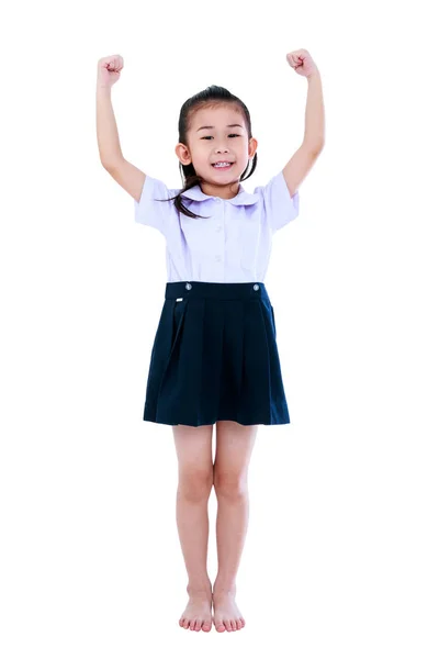 Молода дошкільна дитина в уніформі посміхається в студії. Ізольовані на білому тлі . — стокове фото